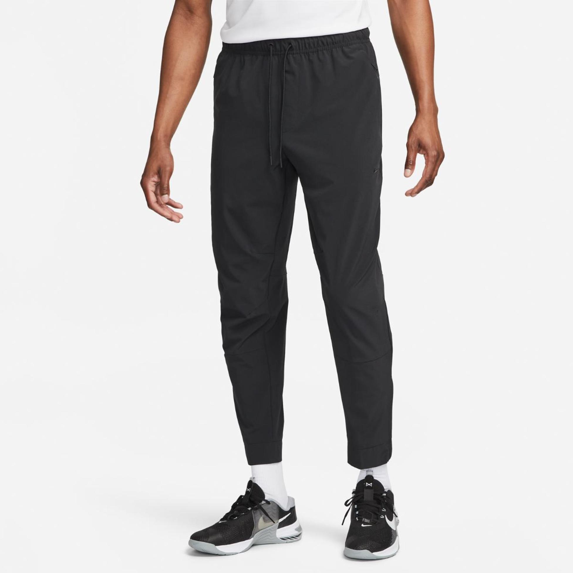 Outlet Чоловічі штани NIKE M NK Dri-FIT UNLIMITED PANT TPR FB7548-010